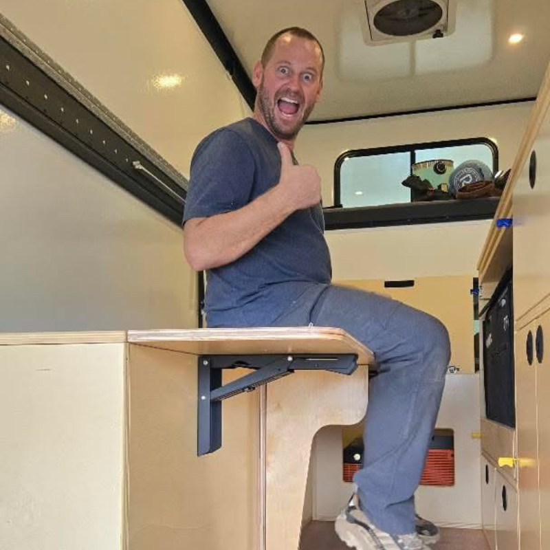Folding bench seat for trucks